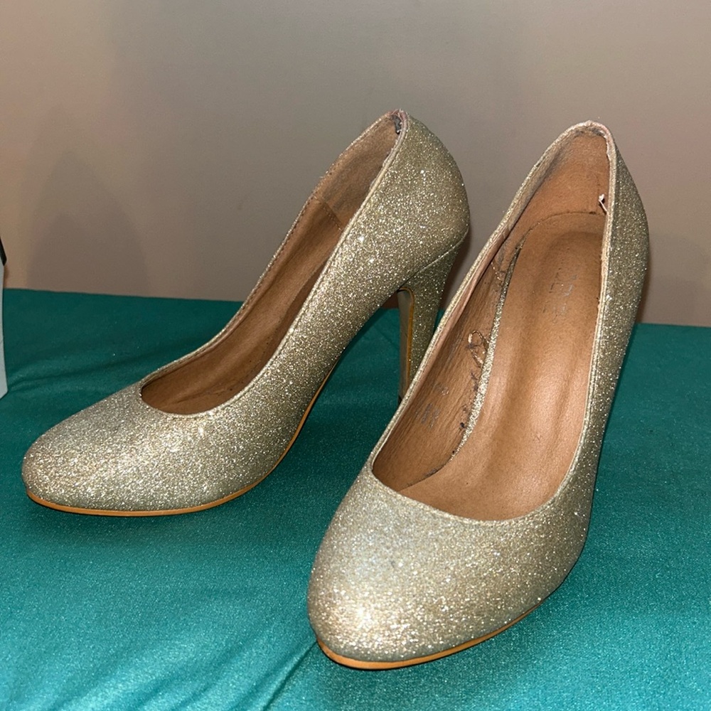 Sparkly gold high heels